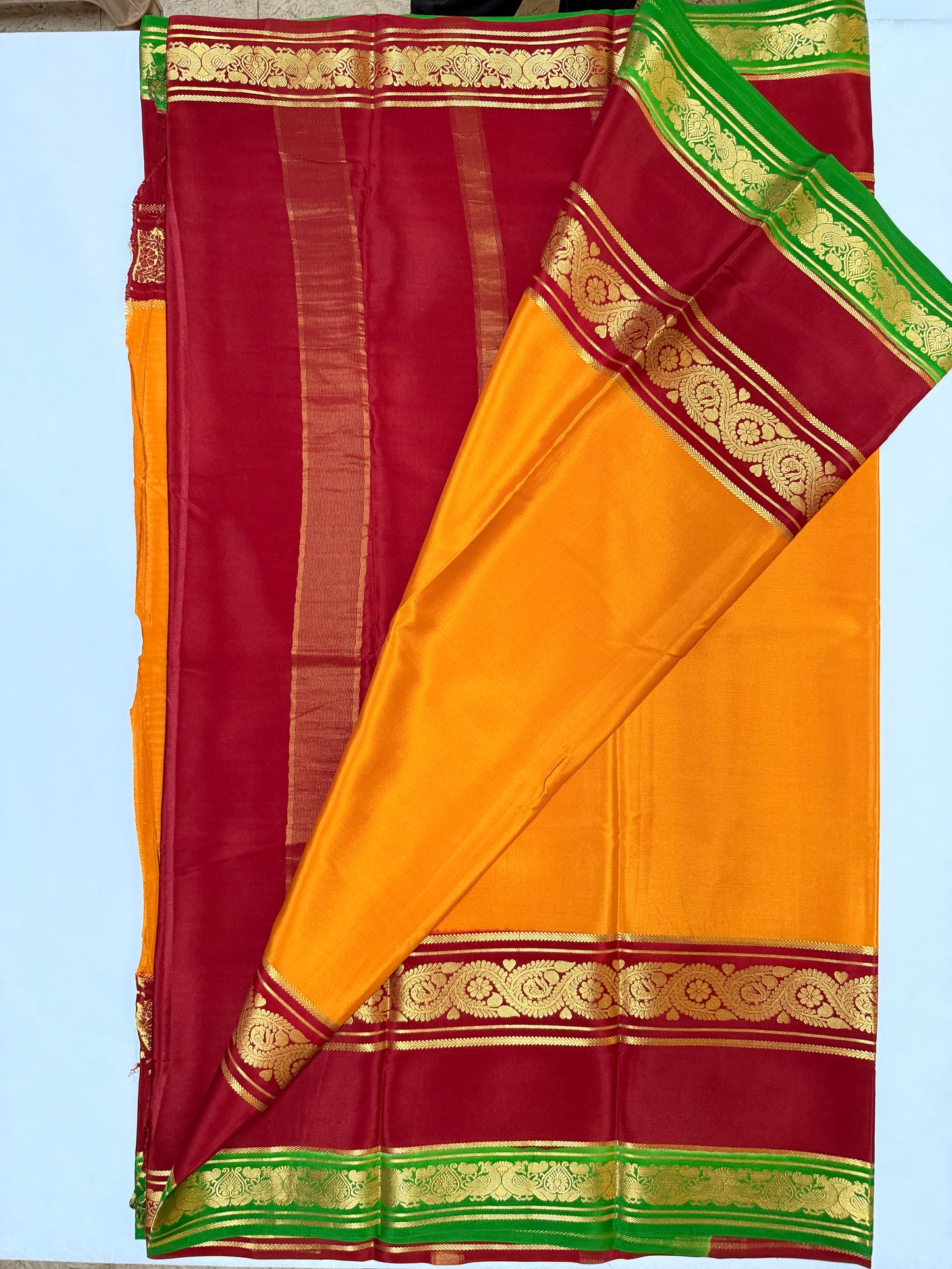 Kanakadhara — Golden Yellow Silk Saree with Red Bentex Border & Green Pallu