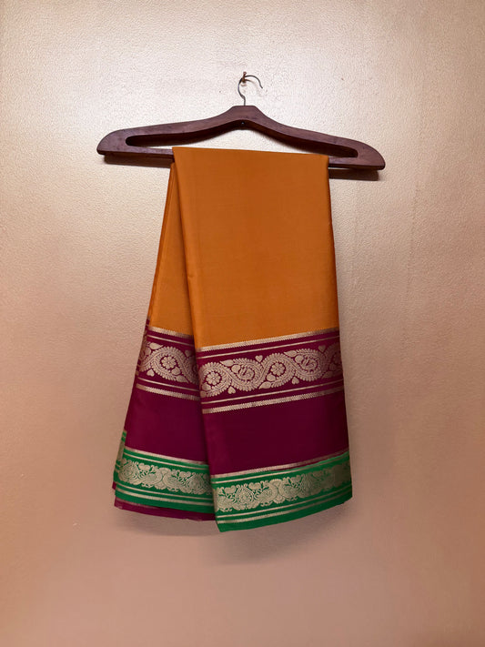 Kanakambari — Mustard Orange Silk Saree with Wine Maroon & Emerald Green Bentex Border