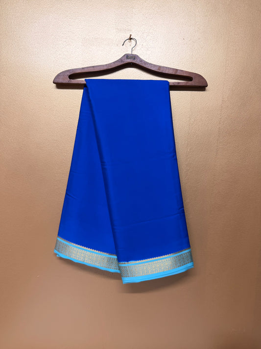 Neelanjali β Royal Blue Silk Saree with Turquoise & Gold Big Piping Border