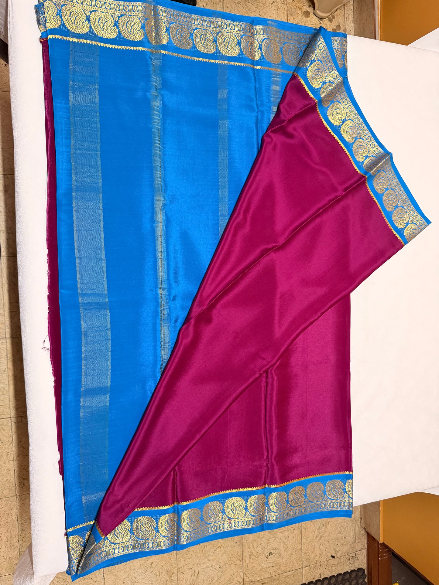 Raktima — Deep Magenta Silk Saree with Turquoise Blue Zari Border