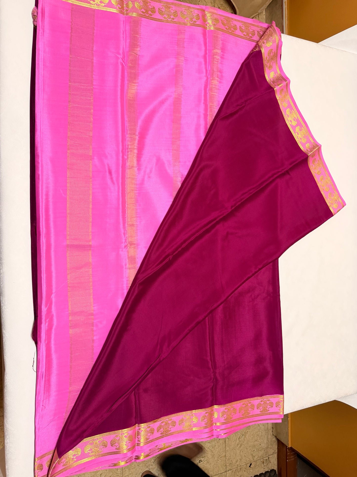 Madhurika — Deep Wine Silk Saree with Pink & Gold Gandaberunda Border