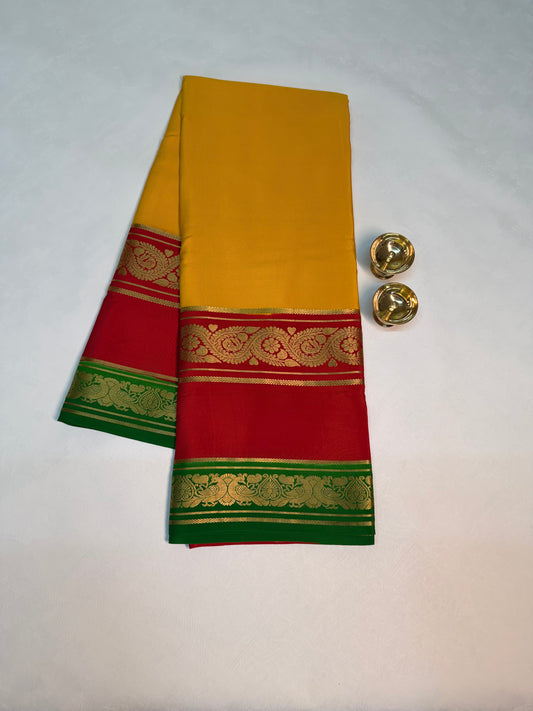 Kanakadhara — Golden Yellow Silk Saree with Red Bentex Border & Green Pallu