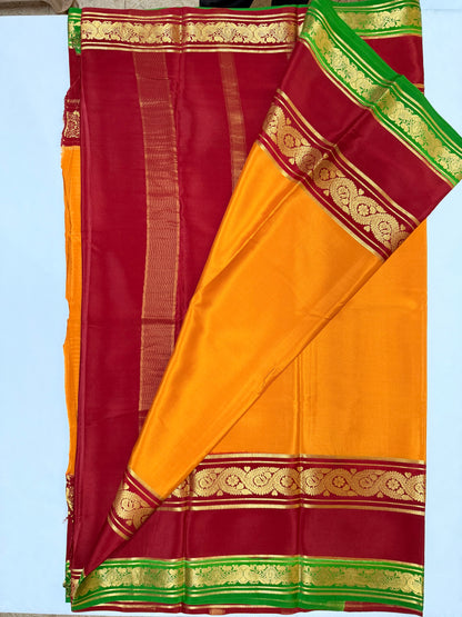 Kanakadhara — Golden Yellow Silk Saree with Red Bentex Border & Green Pallu