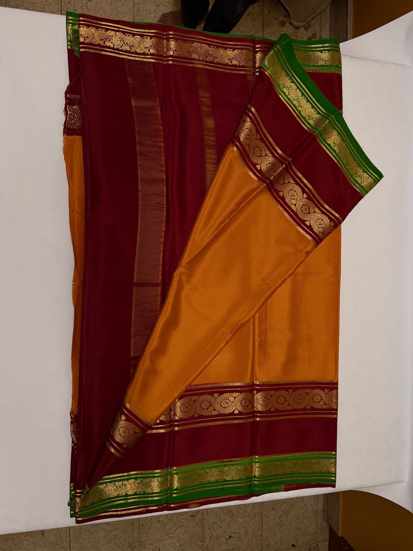 Kanakambari — Mustard Orange Silk Saree with Wine Maroon & Emerald Green Bentex Border