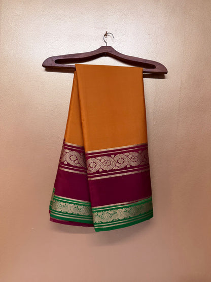 Kanakambari — Mustard Orange Silk Saree with Wine Maroon & Emerald Green Bentex Border