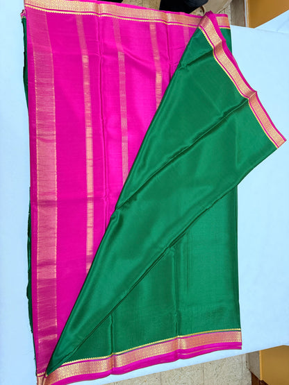 Haritima — Deep Emerald Green Silk Saree with Rani Pink & Gold Big Piping Border