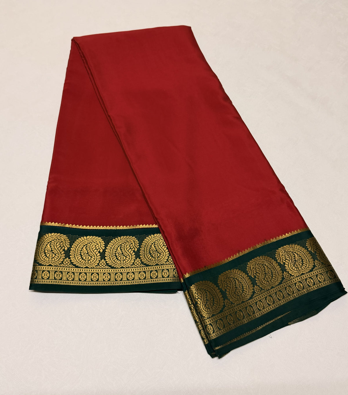 Raktashree — Brick Red Silk Saree with Bottle Green Zari Border