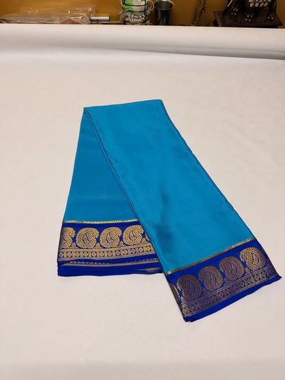 Neelima — Light Turquoise Blue Silk Saree with Navy Blue Zari Border
