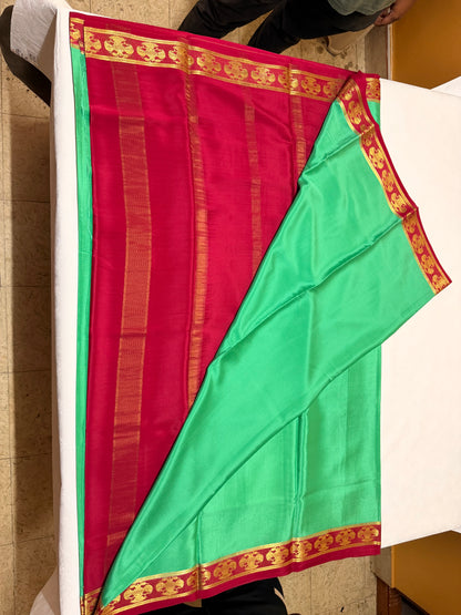 Haritha — Emerald Green Silk Saree with Maroon Gandaberunda Zari Border