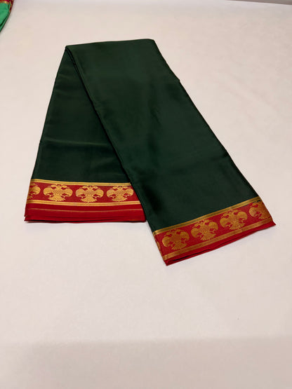Neelavalli — Deep Bottle Green Silk Saree with Red & Gold Gandaberunda Border