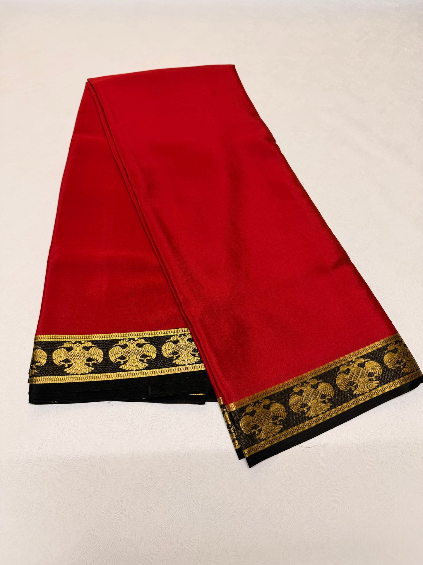 Raktika — Vermilion Red Silk Saree with Black Gandaberunda Zari Border