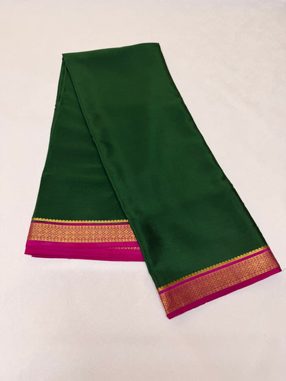 Haritima — Deep Emerald Green Silk Saree with Rani Pink & Gold Big Piping Border