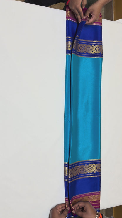 Neelambari — Turquoise Blue Silk Saree with Royal Blue & Maroon Zari Border