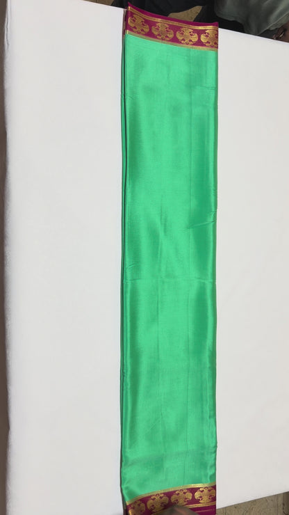 Haritha — Emerald Green Silk Saree with Maroon Gandaberunda Zari Border