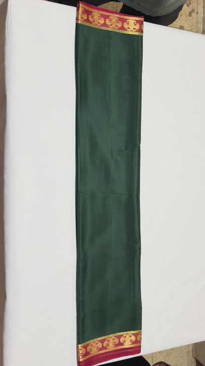 Neelavalli — Deep Bottle Green Silk Saree with Red & Gold Gandaberunda Border