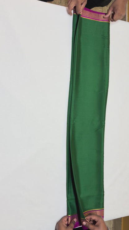Haritima — Deep Emerald Green Silk Saree with Rani Pink & Gold Big Piping Border