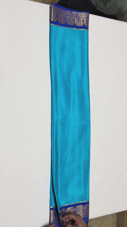 Neelima — Light Turquoise Blue Silk Saree with Navy Blue Zari Border